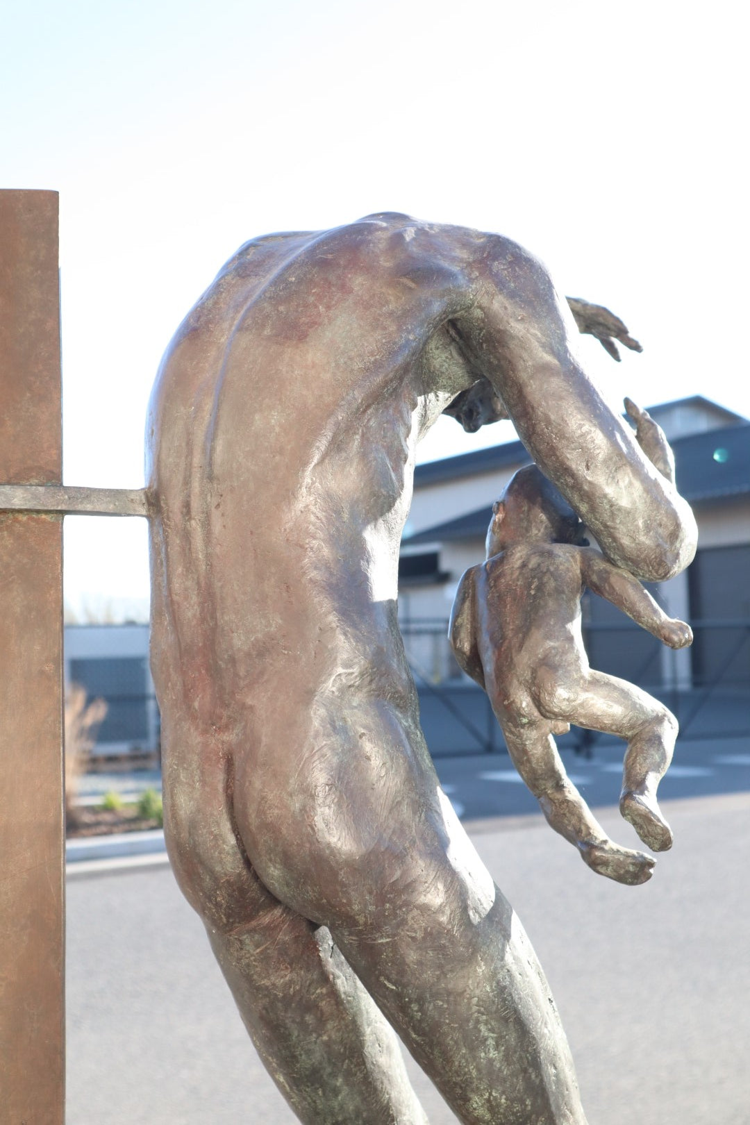 TREVOR SOUTHEY BRONZE SCULPTURE, "FATHERHOOD", DEPICTION OF MAN WITH INFANT, BRONZE AND STEEL, WITH BASE