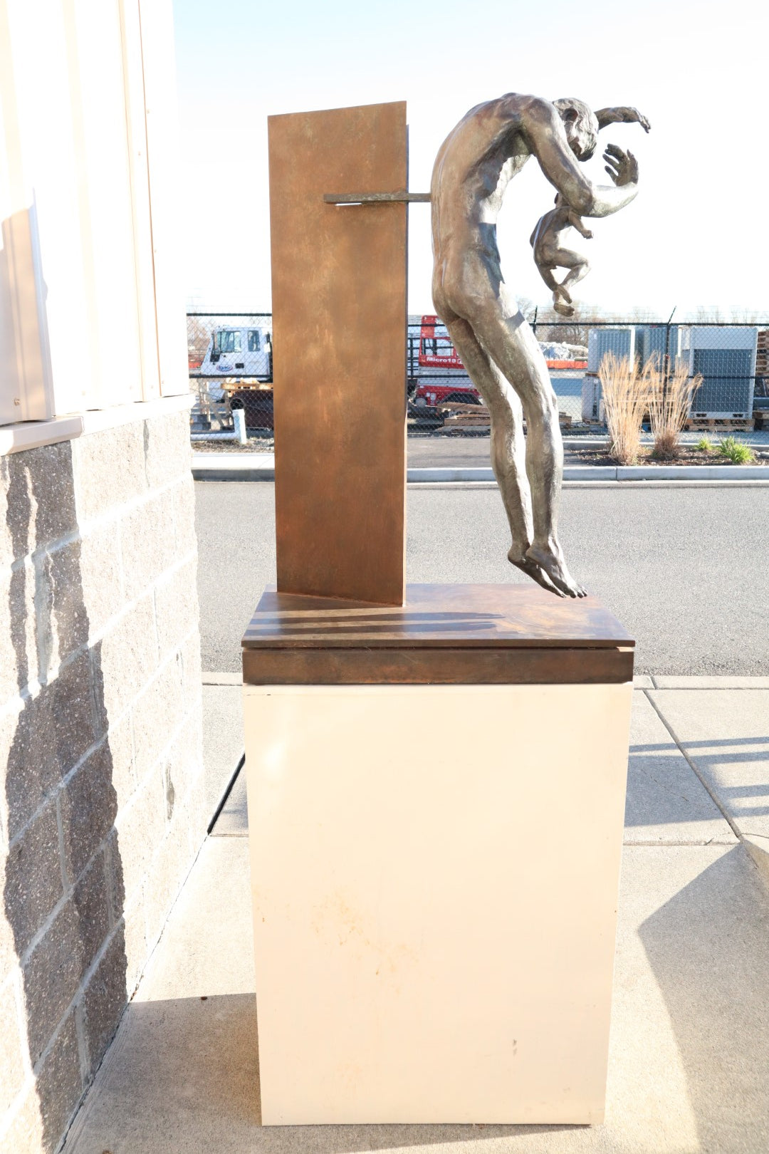 TREVOR SOUTHEY BRONZE SCULPTURE, "FATHERHOOD", DEPICTION OF MAN WITH INFANT, BRONZE AND STEEL, WITH BASE