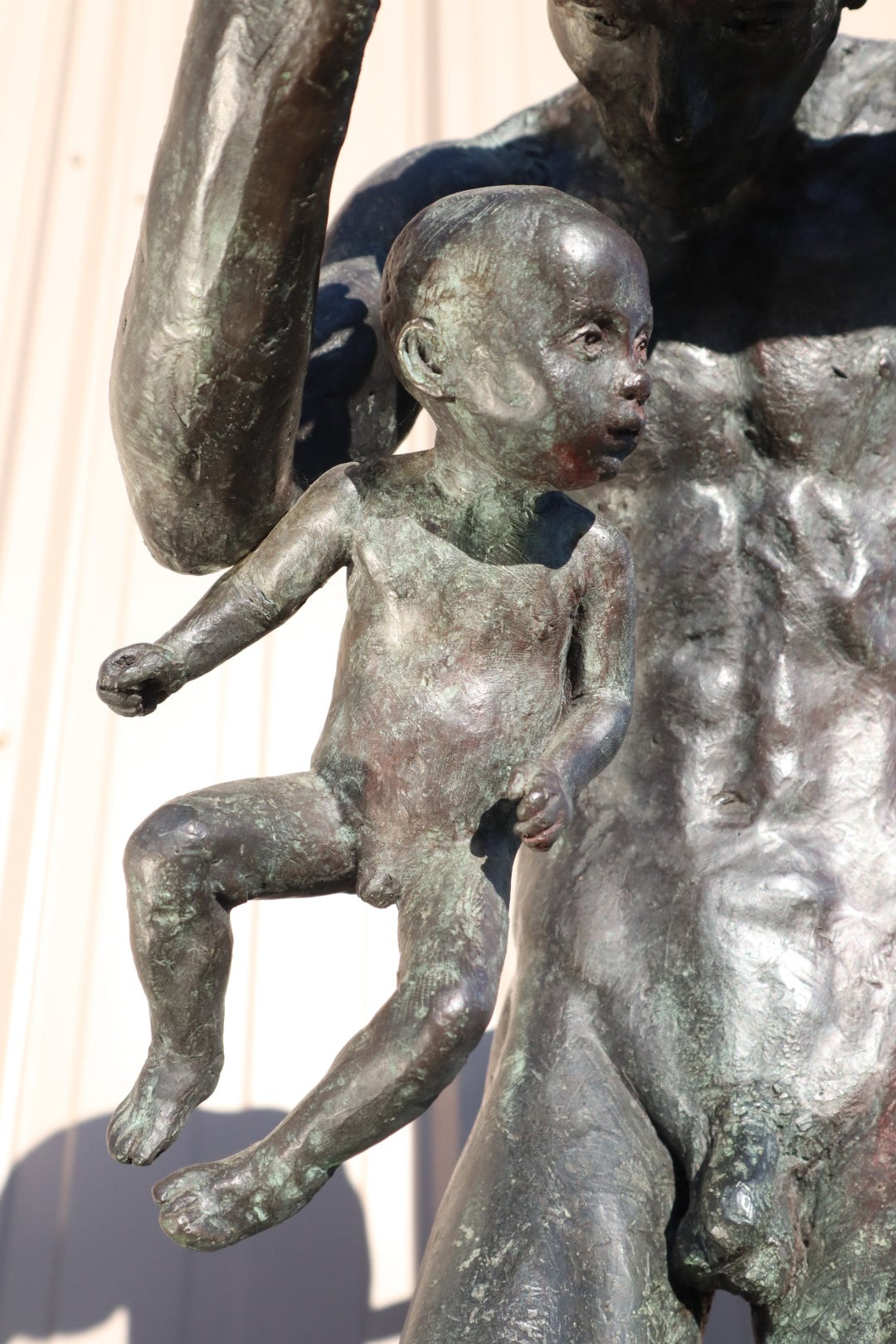TREVOR SOUTHEY BRONZE SCULPTURE, "FATHERHOOD", DEPICTION OF MAN WITH INFANT, BRONZE AND STEEL, WITH BASE